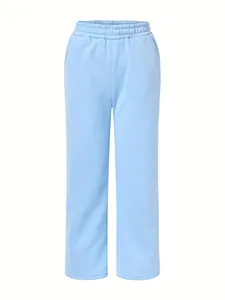 Light blue high-waisted sweatpants with elastic waistband and wide-leg design