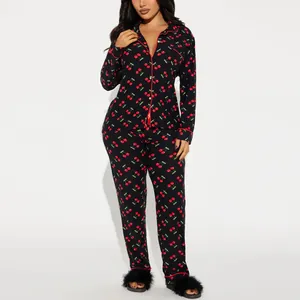 Women's two-piece cherry print pajama set with long sleeves and matching pants for home wear