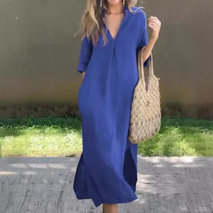 Elegant royal blue maxi dress with V-neck, pleated front, and side slits detail.