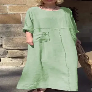 Loose-fit light green cotton linen midi dress with round neck and side pockets