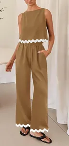 Detail of camel casual two-piece set featuring sleeveless top and scalloped hem pants