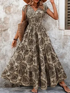 Elegant vintage floral print maxi dress featuring a V-neckline and short sleeves for summer