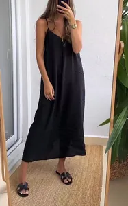 Elegant minimalist black maxi satin slip dress with thin straps for summer leisure