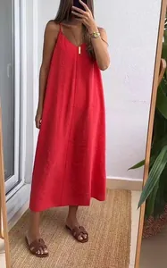 Full view of a vibrant red loose fit spaghetti strap maxi dress for summer