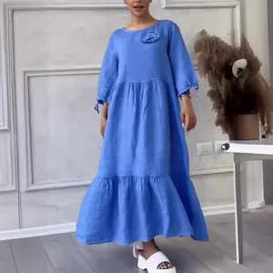 Casual blue long sleeve tiered maxi dress featuring round neck and floral detail