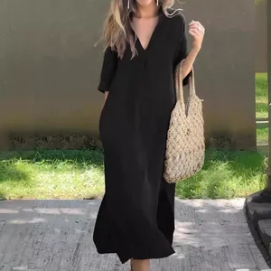 Elegant black summer maxi dress featuring a V-neck, 3/4 sleeves and stylish side slits
