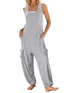 Loose grey sleeveless harem jumpsuit for women with functional double side pockets.