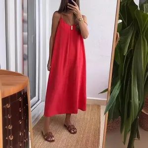 Red sleeveless loose midi cami dress for summer casual wear shown in full-length mirror view
