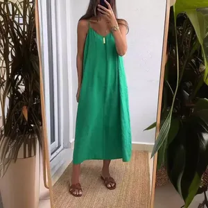 Summer casual loose green solid color spaghetti strap midi dress in mirror selfie