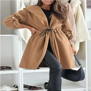 Close-up detail of a women's casual khaki hooded trench coat featuring a drawstring waist design.