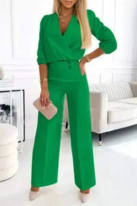 Modern women's green two-piece outfit featuring a V-neck top and wide-leg trousers