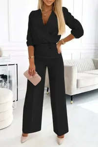 Elegant black two-piece set featuring a V-neck top and wide-leg trousers for women.