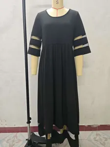 Elegante vestido negro de talla grande con elegantes mangas de retazos de malla para mujer