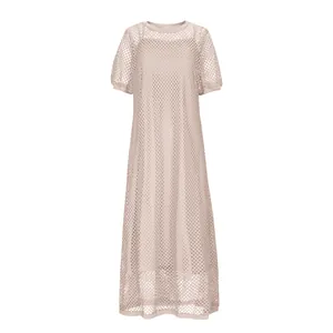 Detail of women's two-piece beige mesh maxi dress with round neck and short sleeves.
