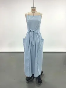 Front view of a light blue sleeveless maxi dress with side pockets on a mannequin