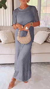 Elegant grey hollow-out midi dress featuring short sleeves and a classic round neck design.