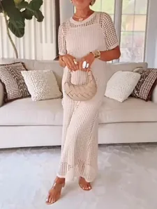 Elegant white hollow-out crochet maxi dress for women with short sleeves and chic style
