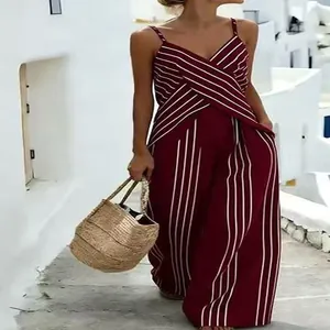 Holiday maroon striped V-neck top and wide-leg pants set shown on a model outdoors