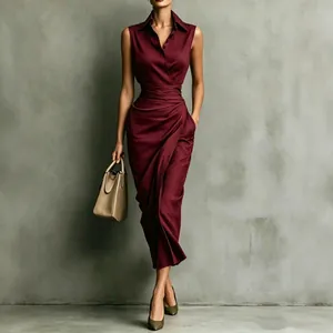 Elegant burgundy sleeveless shirt dress with asymmetrical draped waist and collared neck.