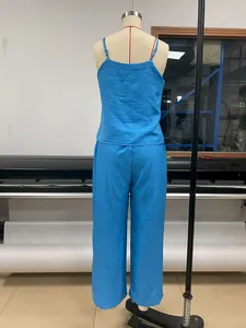 Back view of a blue two-piece set featuring a camisole and wide-leg trousers