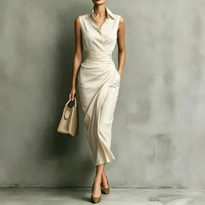 Elegant sleeveless beige midi dress with asymmetric draping and waist detail on model