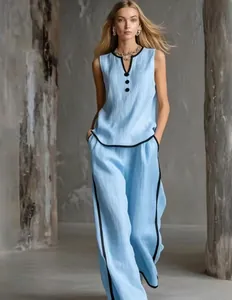 Stylish light blue two-piece set featuring sleeveless V-neck top and wide-leg trousers