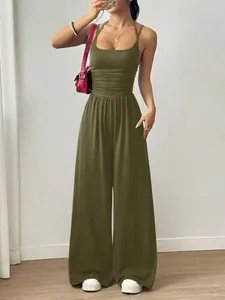 Detail view of a stylish olive green wide-leg sleeveless halter jumpsuit for summer casual wear