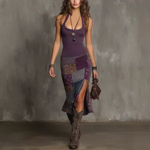 Detailed view of bohemian patchwork midi skirt with high slit and purple halter top