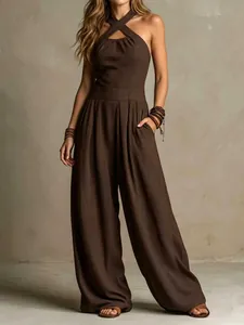 Detailed view of a brown ribbed cross halter jumpsuit with elegant wide leg design