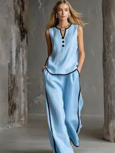 Elegant light blue sleeveless V-neck top and wide-leg pants two-piece set with black trim details