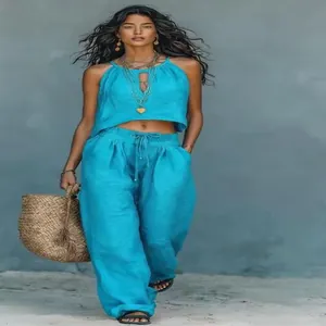 Elegante conjunto de verano bohemio de dos piezas en cian con top corto y pantalón ancho