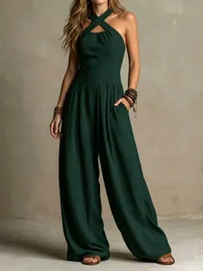 Elegant dark green halter neck ribbed jumpsuit with wide leg silhouette