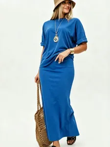 Casual blue two-piece set featuring a loose t-shirt and long maxi skirt for a summer look
