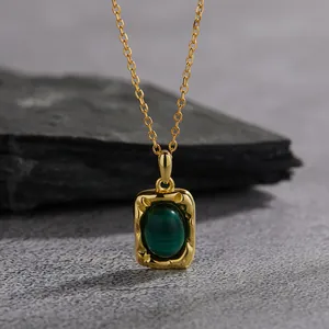 Close-up detail of vintage S925 silver necklace with green malachite pendant for women.