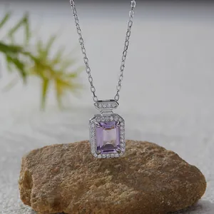 Close-up view of a rectangular purple gemstone pendant on a S925 silver chain