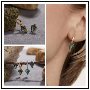 Detailed view of S925 silver earrings with green moss agate in elegant kite shape.
