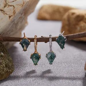 Macro detail view of kite-shaped green moss agate earrings in S925 silver and gold finish