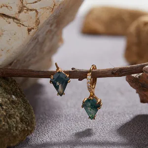 Macro detail of natural moss agate kite earrings in gold-plated sterling silver