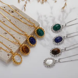 Detail of S925 silver necklaces featuring natural Lapis Lazuli and Malachite oval pendants.