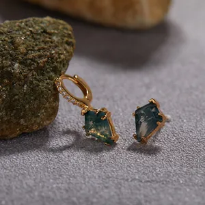Macro view of kite-shaped moss agate earrings in gold-plated sterling silver