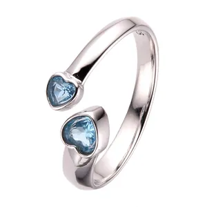 Anello regolabile in argento sterling S925 con due topazi blu naturali a forma di cuore