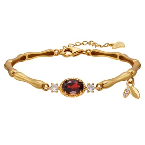 Elegant S925 gold-plated bamboo bracelet with an oval natural red garnet gemstone
