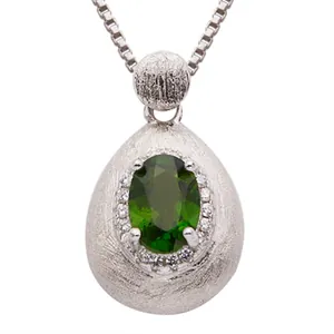 Elegant S925 silver pendant necklace featuring a green gemstone and brushed texture