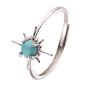 Elegant S925 sterling silver sunburst ring featuring a natural turquoise stone, open band