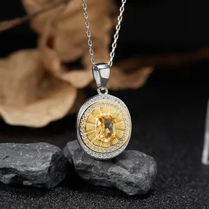 Exquisite close-up of a vintage S925 silver round pendant with a yellow oval gemstone