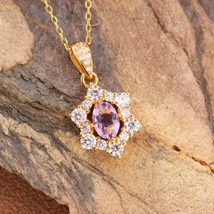 Detailed close-up of sunflower shaped s925 silver pendant with oval amethyst and zircons