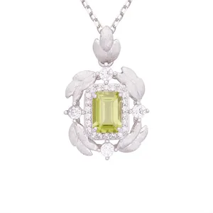 Elegant S925 sterling silver emerald-cut green gemstone necklace with feather detail