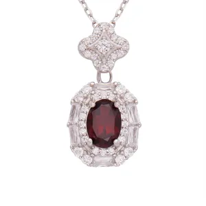 S925 silver necklace with oval dark red garnet pendant and floral bail design