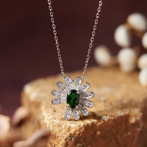 Exquisite S925 silver daisy necklace featuring an oval green gemstone pendant detail