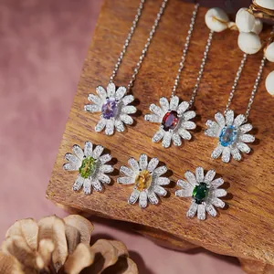 Elegant close-up view of S925 silver daisy jewelry set with colorful oval gemstones